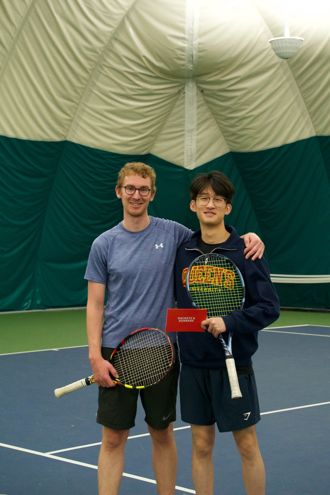 Two members on the indoor court